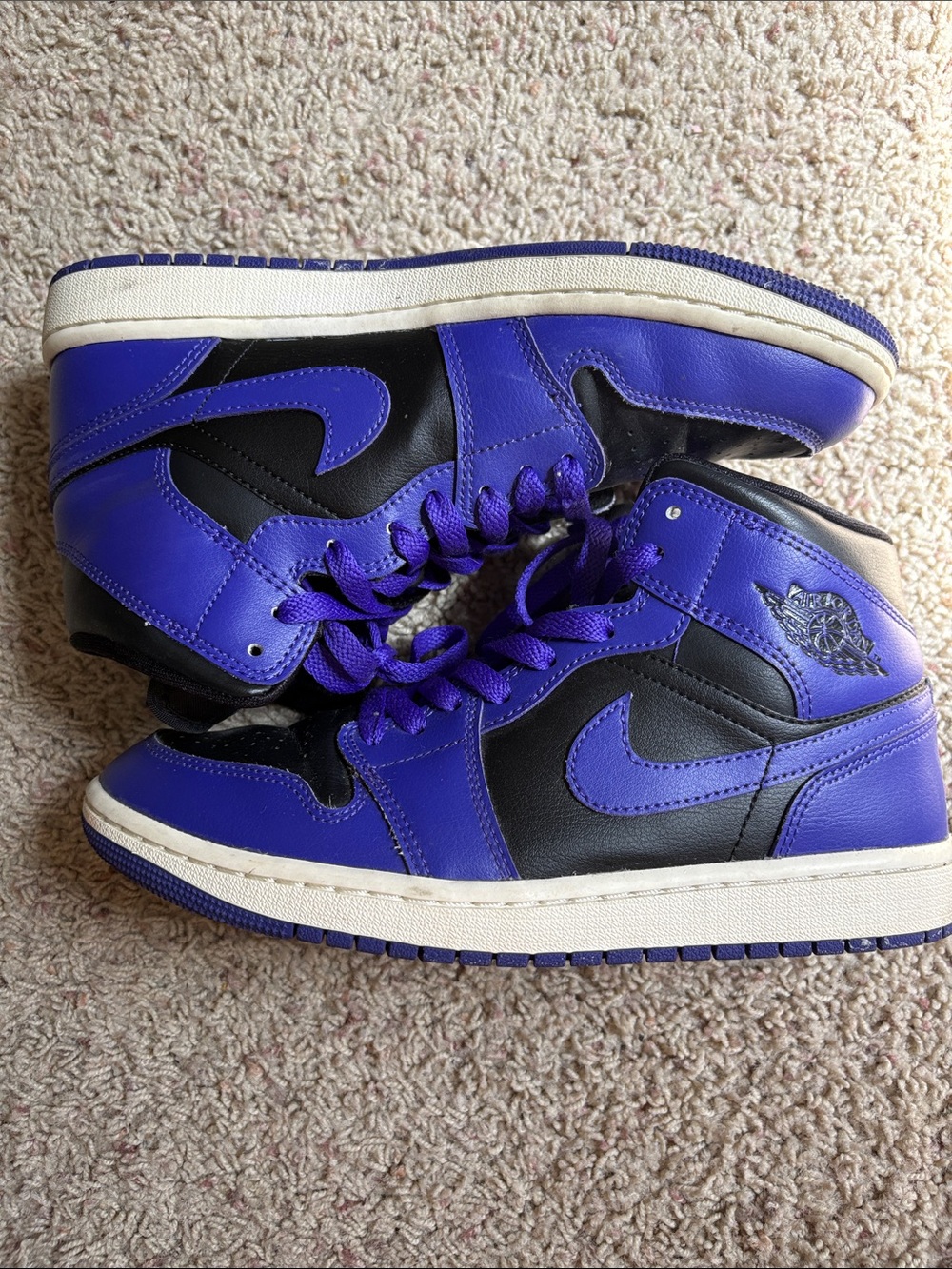 Nike Women’s Air Jordan 1 Mid Purple and Black Sneakers